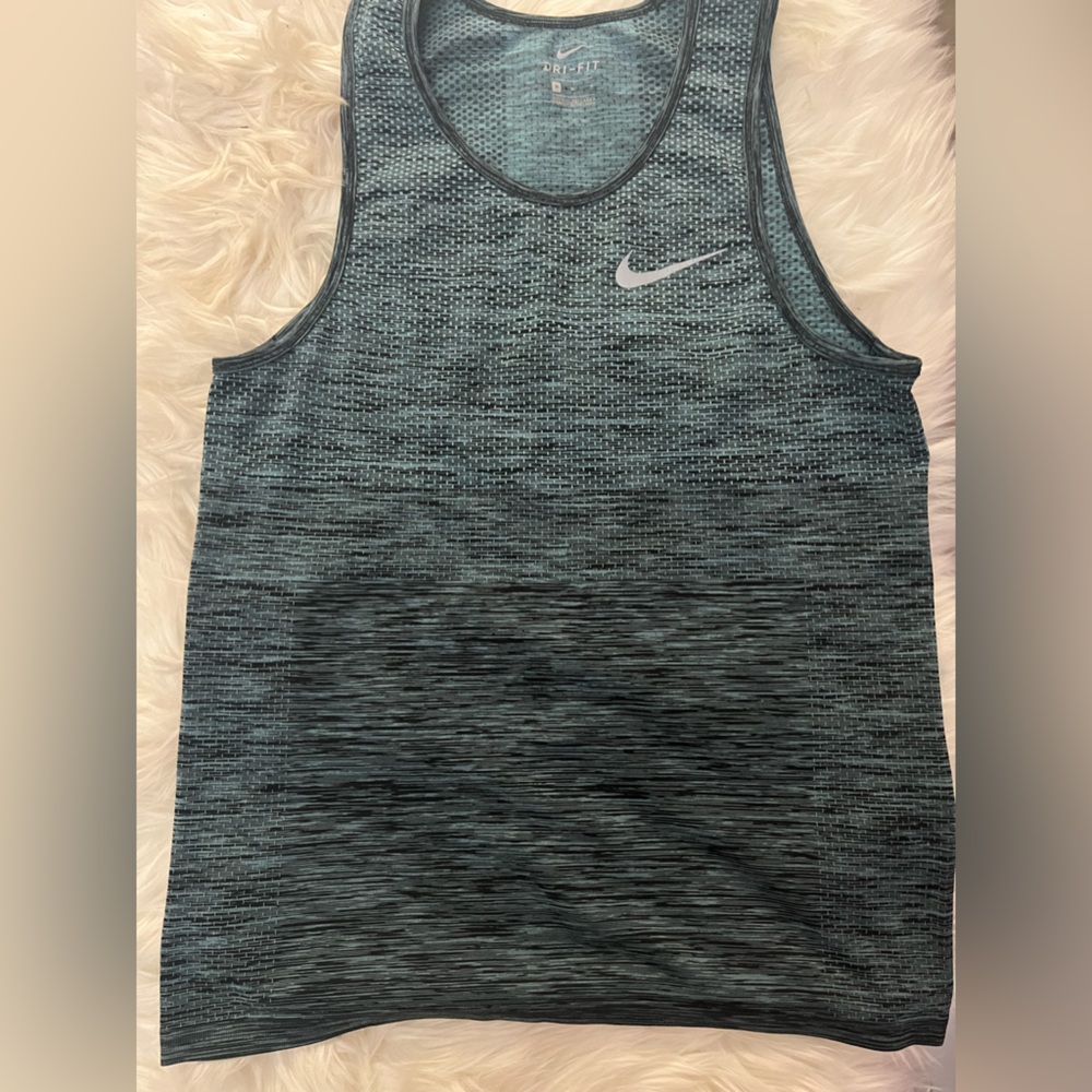 Nike Dri Fit tank top. Size M. Blue and black color combo. Nice condition.